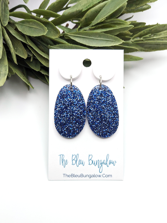 Blue Glitter Dangles With White Stud Topper